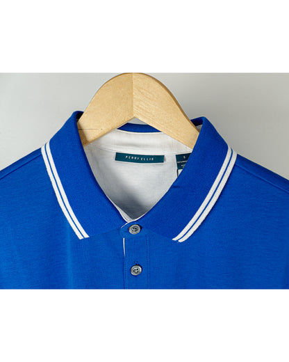 Tipo polo Perry Ellis, azul con detalles blancos en el cuello